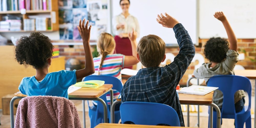 International classroom setting with smaller class sizes and mixed-nationality students.