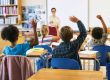 International classroom setting with smaller class sizes and mixed-nationality students.