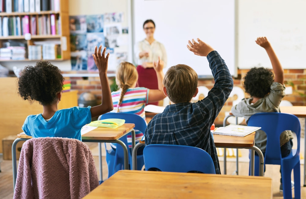 International classroom setting with smaller class sizes and mixed-nationality students.