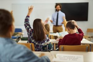 Comparison of two classes; students actively engaging in class in one, and taking an exam in the other.